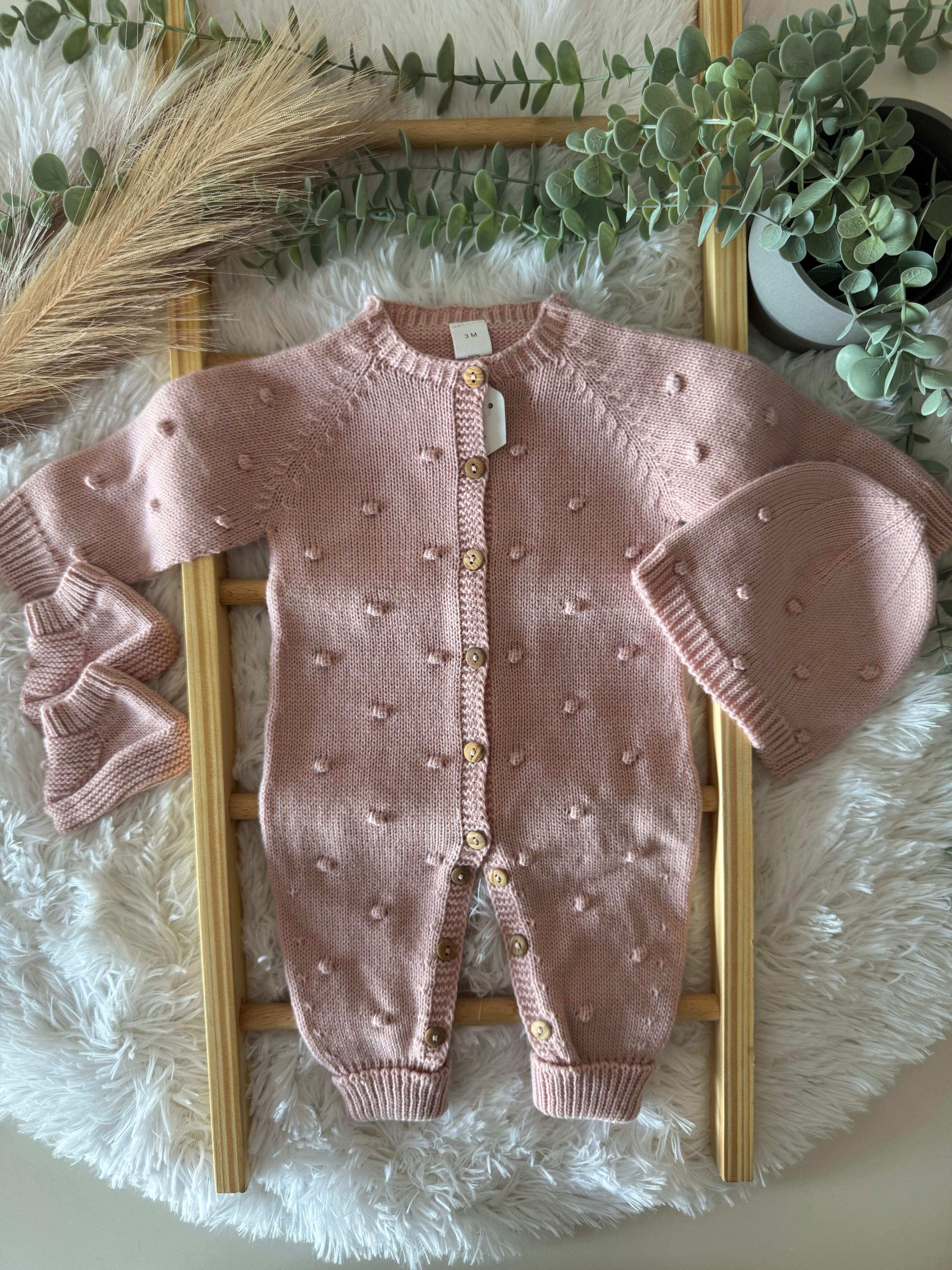 Macacão de malha rosa velho