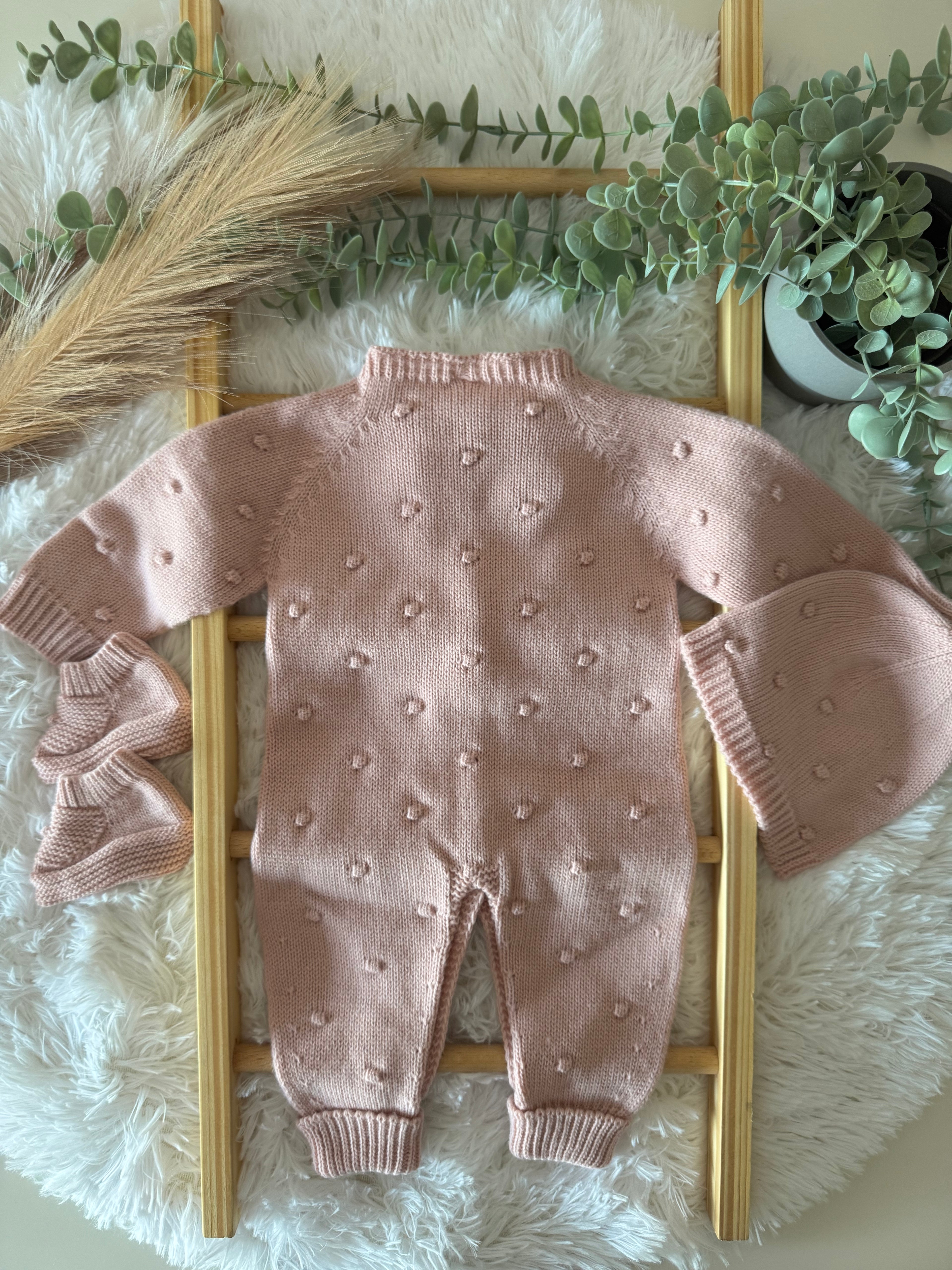 Macacão de malha rosa velho