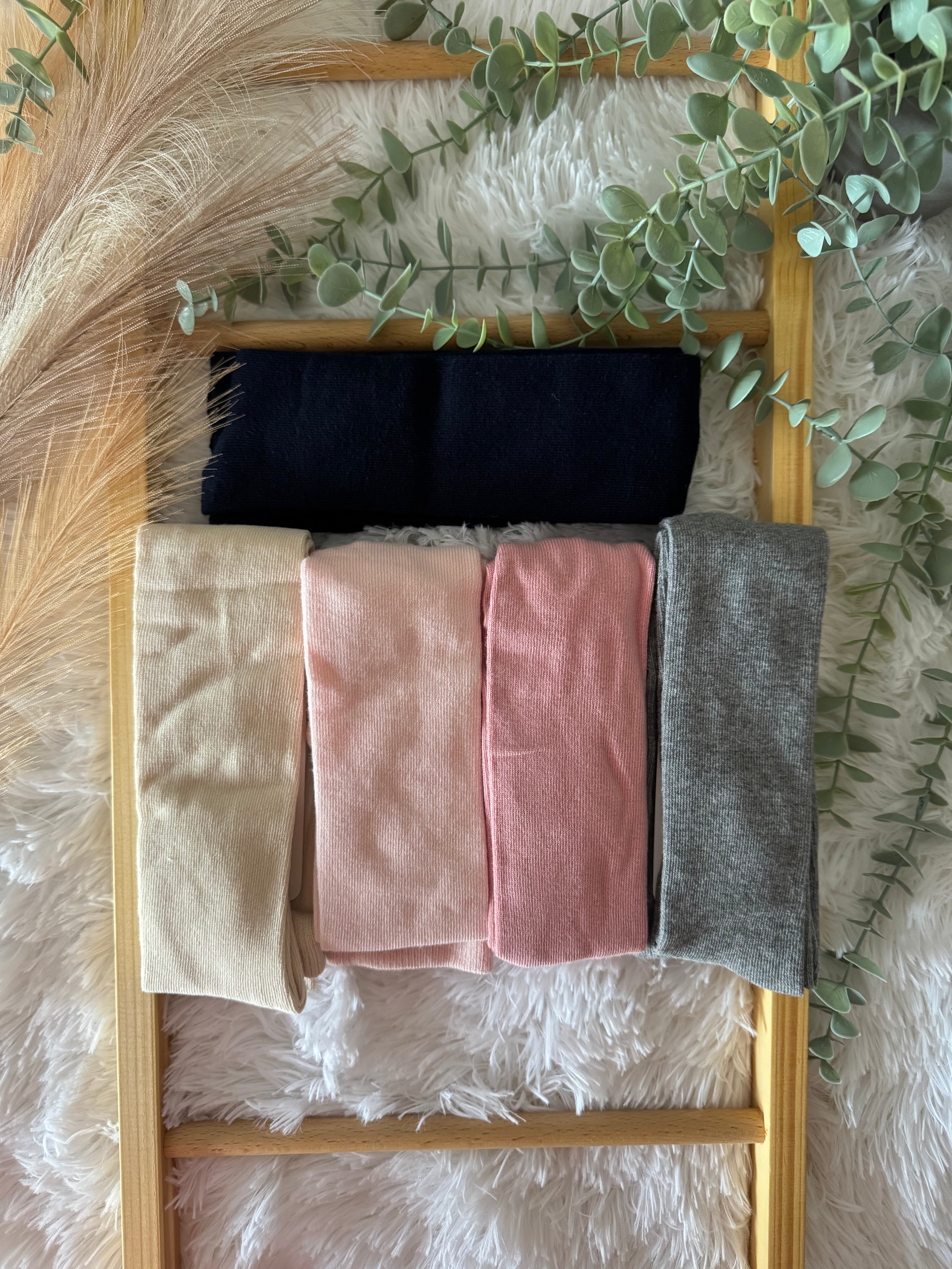 Collants areia, rosa claro, rosa escuro, cinza e azul